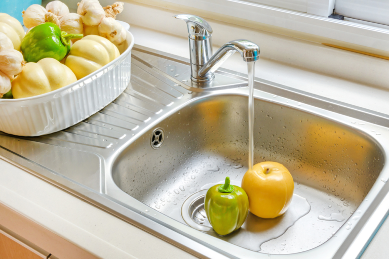 installing stainless steel sink n new kitchen cabinet